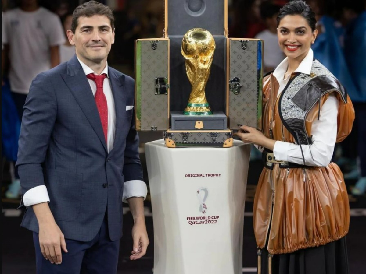 Deepika Padukone In FIFA: दीपिका पादुकोण ने फीफा विश्व कप ट्रॉफी से उठाया पर्दा, एक्ट्रेस के लुक पर टिकी नजरें